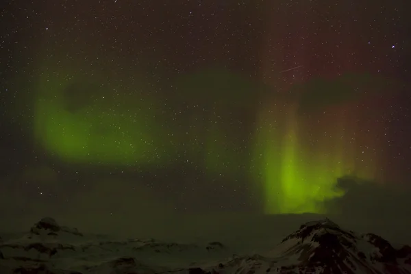 Different colors of northern lights in Iceland — Stock Photo, Image