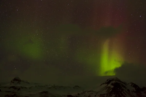 Diferentes colores de luces del norte en Islandia —  Fotos de Stock