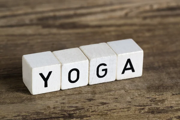 The word yoga written in cubes — Stock Photo, Image