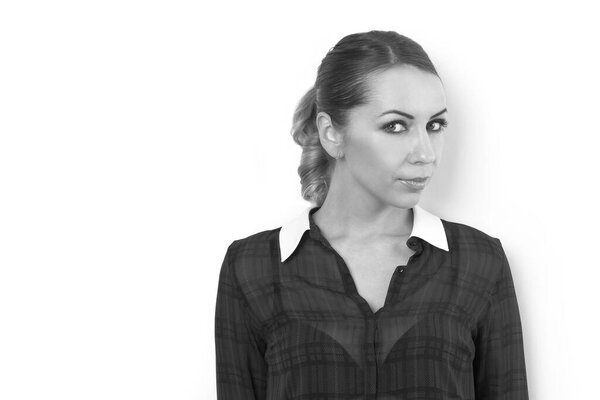 young slim girl in a black dress on a white background