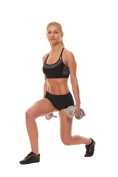 Sexy athletic blonde girl with dumbbells — Stock Photo, Image