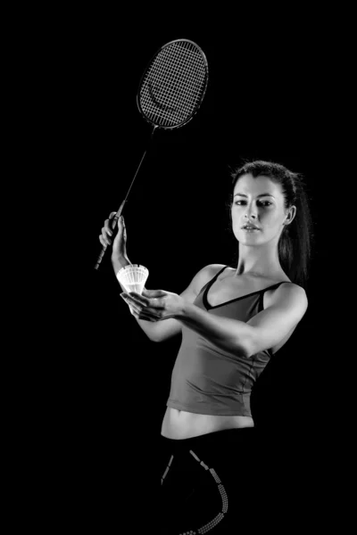 Žena s badmintonovou raketou — Stock fotografie