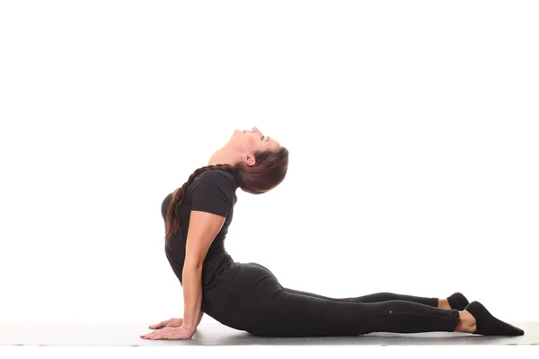 Young flexible girl doing yoga — Stock Photo, Image