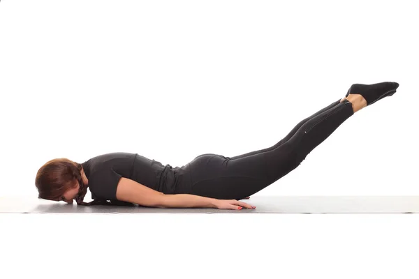 Young flexible girl doing yoga Stock Image