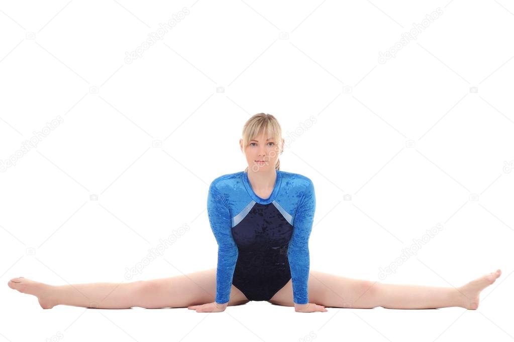 young girl performs gymnastic exercises