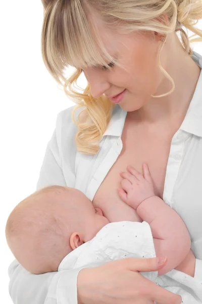 Mother breast feeding her child Royalty Free Stock Images