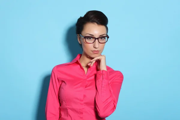 Attractive cheerful young woman in glasses Stock Picture