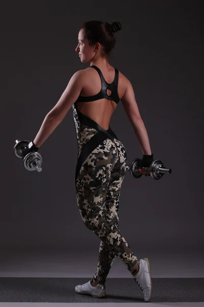 Woman with dumbbells — Stock Photo, Image