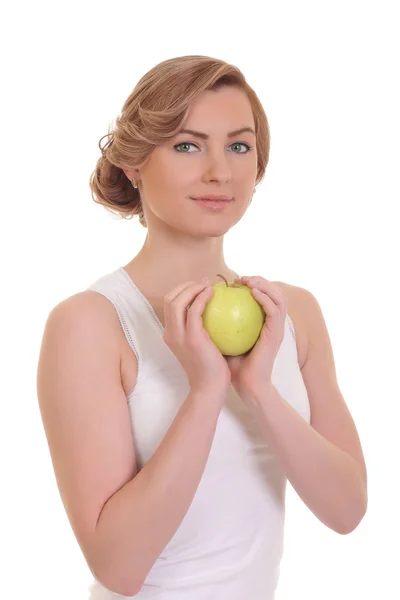 Junge Fitness-Frau glücklich lächelnd mit Apfel in der Hand — Stockfoto