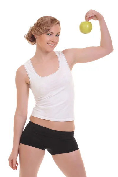 Genç fitness kadın mutlu gülümseyen holding elma — Stok fotoğraf