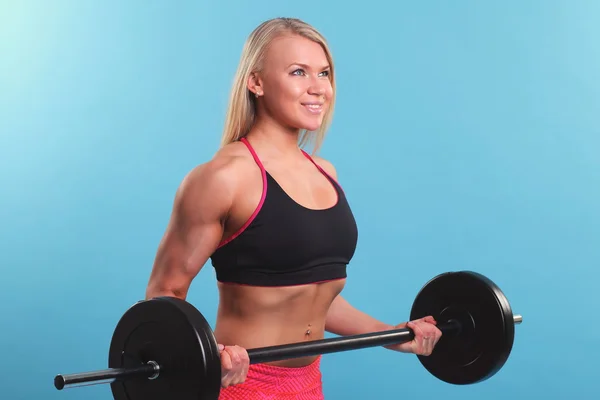 Fitness meisje liftings gewichten — Stockfoto
