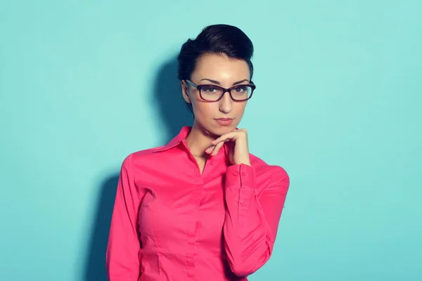 Attractive cheerful young woman in glasses Stock Photo