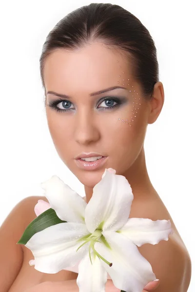 Young woman with a lily — Stock Photo, Image