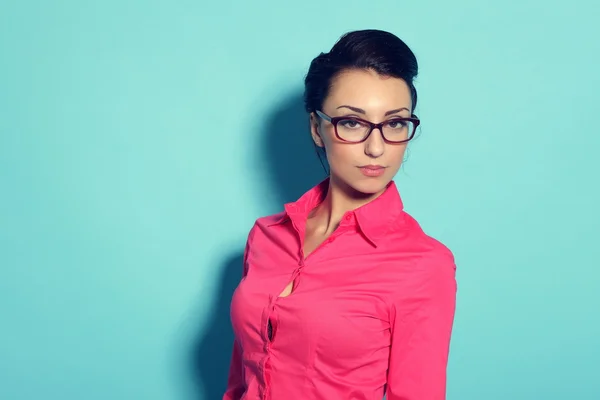 Attractive cheerful young woman in glasses Stock Photo