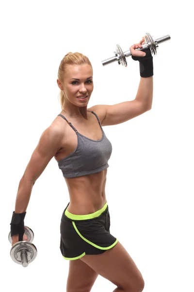 Beautiful sporty  woman working out with dumbbells — Stock Photo, Image