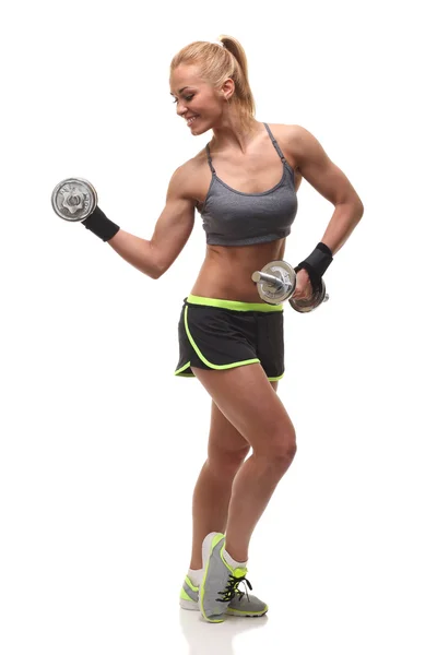 美丽的运动型女人与哑铃锻炼 — 图库照片