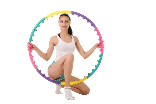 Kobieta trzyma Hula-hoop — Zdjęcie stockowe