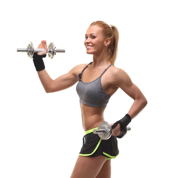 Beautiful sporty  woman working out with dumbbells — Stock Photo, Image