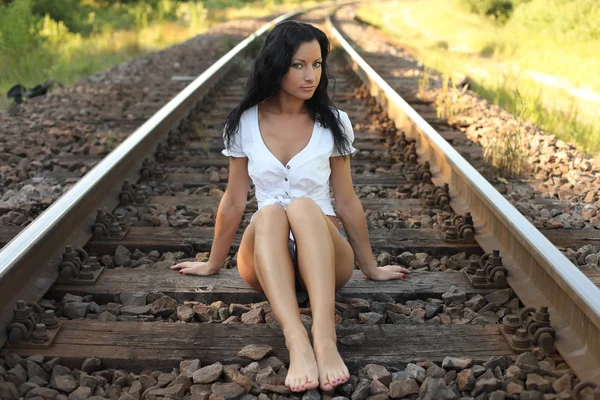 Brunette on the rails — Stock Photo, Image