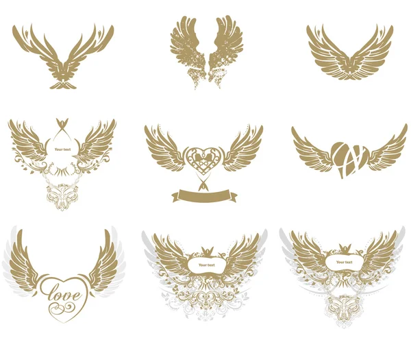 Collection of grunge tattoo wings — Stock Vector