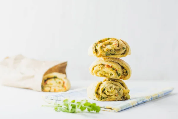 Home made buns with garlic, green parsley and sweet pepper in a napkin white background. — Stock Image Home Made Buns Garlic Green Parsley Sweet Pepper Napkin White Royalty Free Stock Images