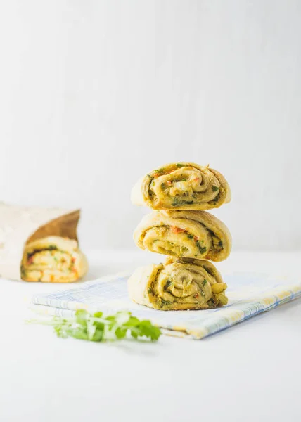 Home made buns with garlic, green parsley and sweet pepper in a napkin white background. — Stock Image Home Made Buns Garlic Green Parsley Sweet Pepper Napkin White Royalty Free Stock Photos