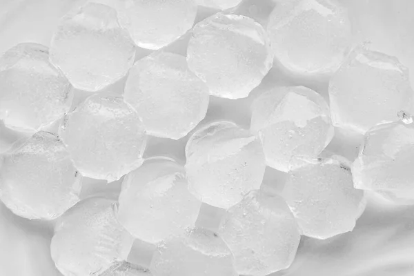 Ice cubes on a white background. File contains clipping path. — Stock Photo, Image