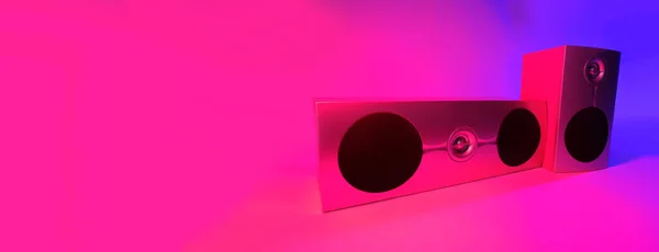 music speakers in neon color photo taken in a photo studio