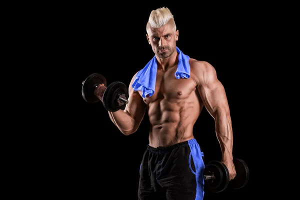 Closeup of a muscular young man lifting weights — Stock Photo, Image