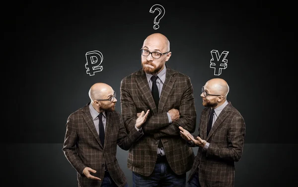 Three identical men argue among themselves about important issues — Stock Photo, Image