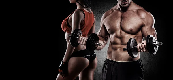 Athletic couple poses for the camera — Stock Photo, Image