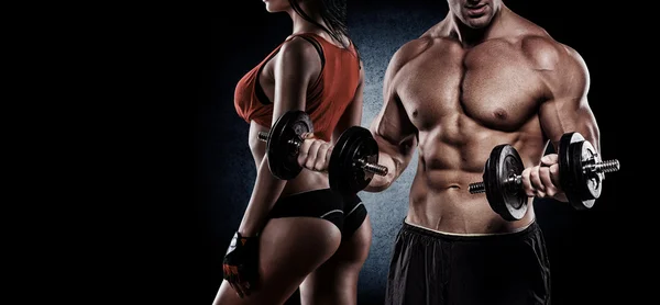 Athletic couple poses for the camera — Stock Photo, Image