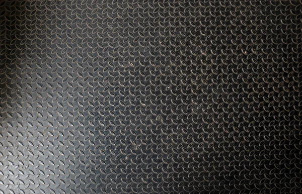 Metal floor plate with diamond steel pattern, metal sheet texture background.