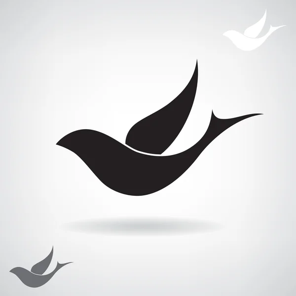 Uçan bir kuş stilize siyah siluet.