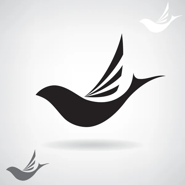 Silhueta preta estilizada de um pássaro voador . —  Vetores de Stock