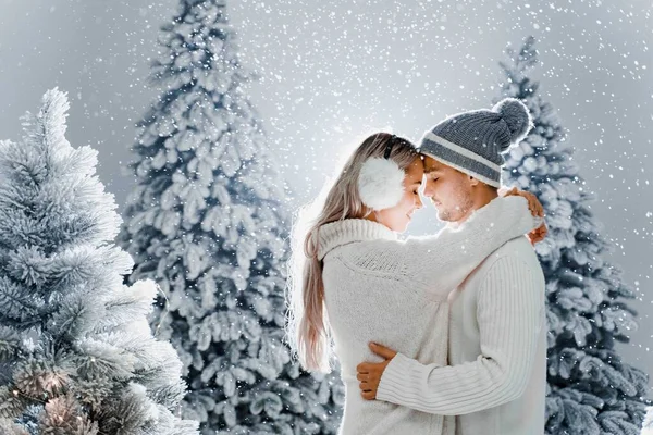 Happy Young Couple Hugs Smiles Snow Falls Christmas Trees Eve — Stock Photo, Image