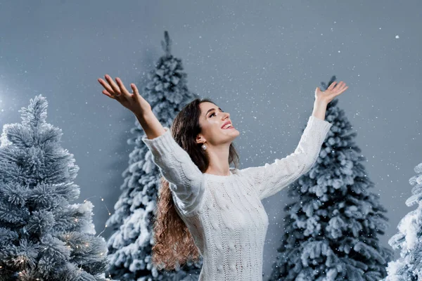 Happy Girl Smiles Touches Falling Snow Eve New Year Young — Stock Photo, Image