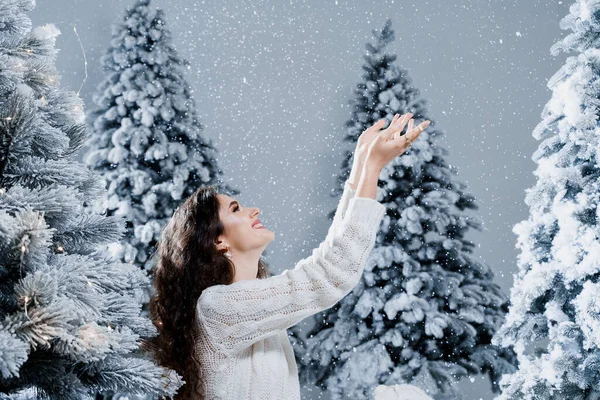 Happy Girl Smiles Touches Falling Snow Eve New Year Young — Stock Photo, Image