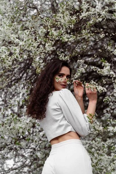 Girl Touches Sniffs Branch White Flowering Tree Medical Mask Spring — Stock Photo, Image
