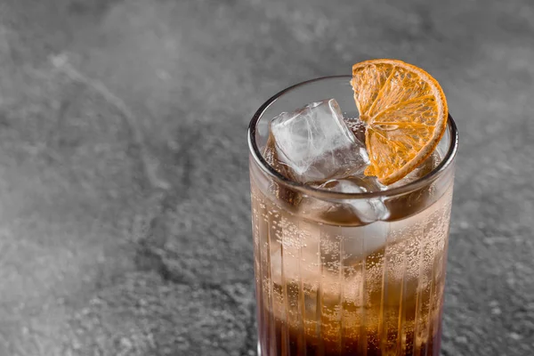 Cocktail Glass Cola Alcohol Ice Decorated Dried Orange Gray Background — Stock Photo, Image