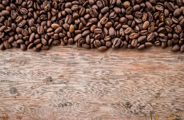 Koffiebonen Houten Ondergrond — Stockfoto