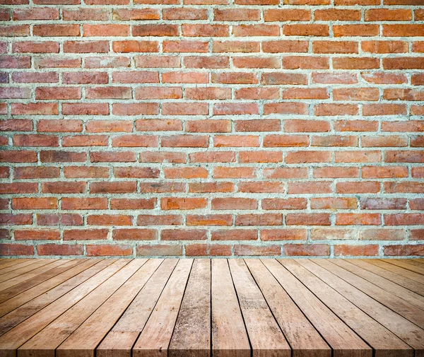 empty room with wood floor and brick wall background