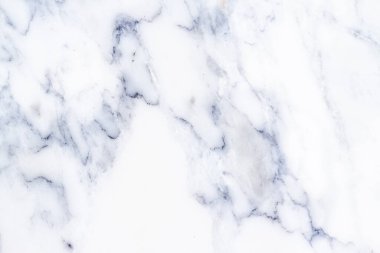 Arkaplan veya tasarım sanatı için doğal desenli beyaz mermer dokusu.