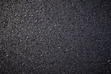 Siyah ve beyaz çizgileri olan asfalt yol dokusu