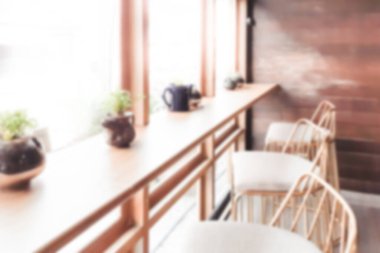 Arka plan için soyut bulanık kahve dükkanı iç mimarisi