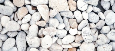 Çakıl taşlarının arka planı. deniz taşları.