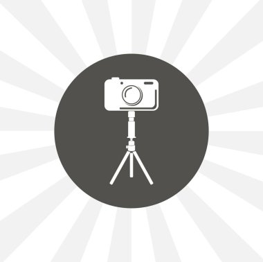 Tripod üzerindeki kamera katı vektör simgesini izole etti