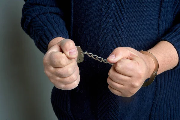 Mens hands in handcuffs close up — Stock Photo, Image