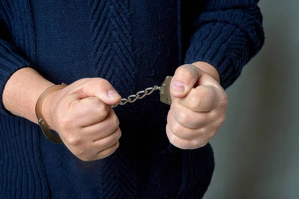 Male hands in handcuffs close-up — Stock Photo, Image