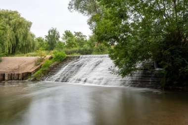 Brue Nehri 'nin Somerset' teki West Lydford 'daki vadiden geçişi uzun sürdü.